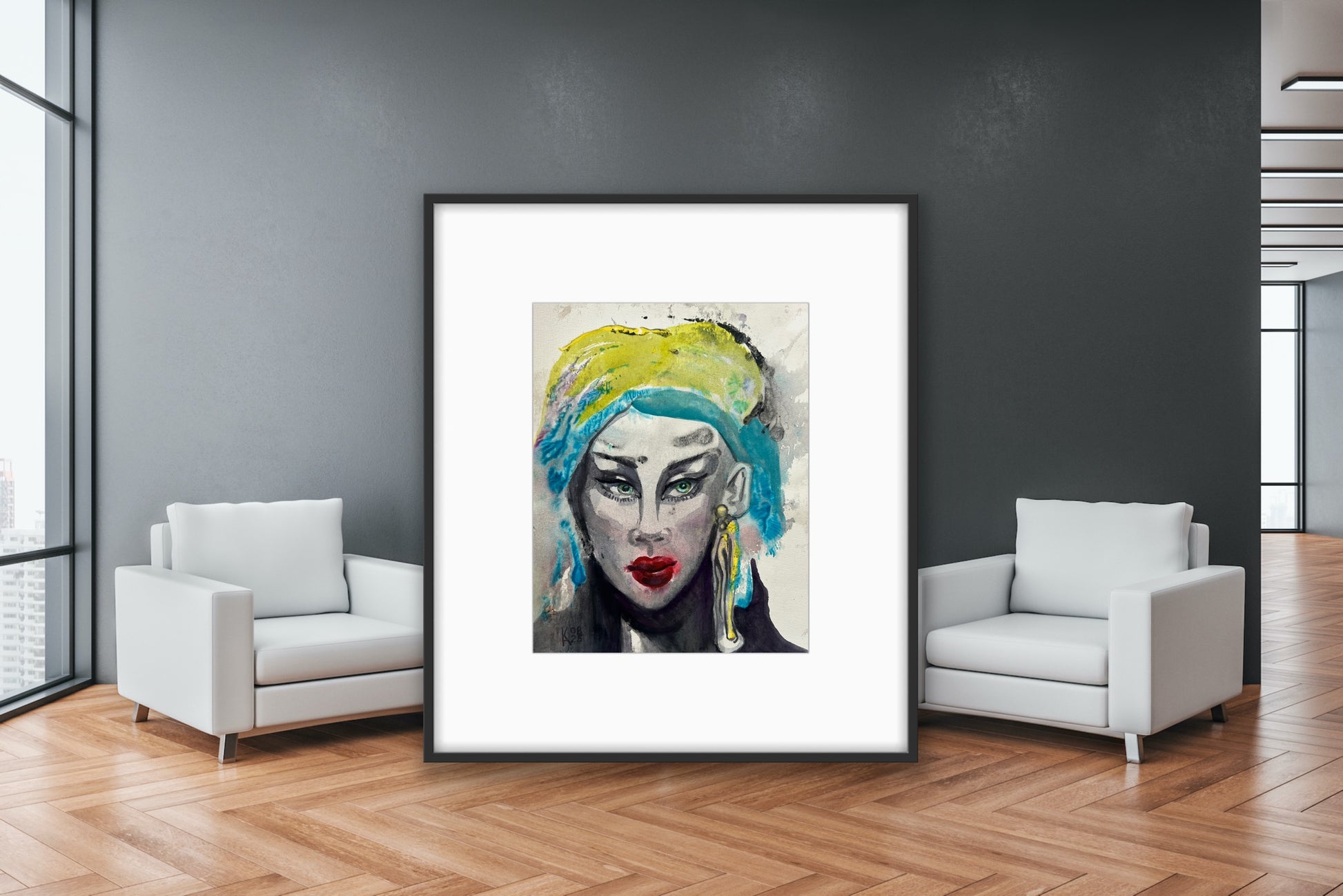 Large framed original watercolor portrait Turquoise Reverie leaning against dark wall between two white armchairs