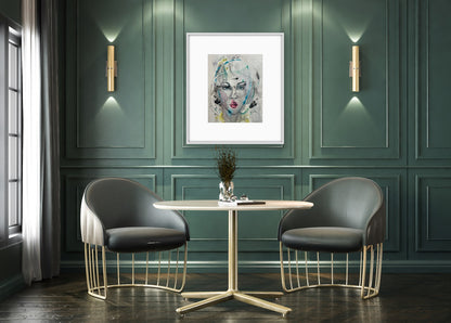 Framed watercolor portrait displayed in an elegant dining room with dark green wall paneling, two gold wall sconces, and modern chairs