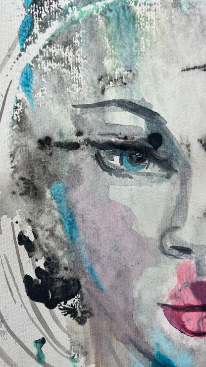 Close-up detail of a watercolor painting showing a woman's blue eye and dark eyeliner with abstract paint splatters