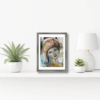 Original acrylic portrait painting in gray frame on shelf with fern plant and white lamp, surrealist feminine art by Ekaterina Anchugova