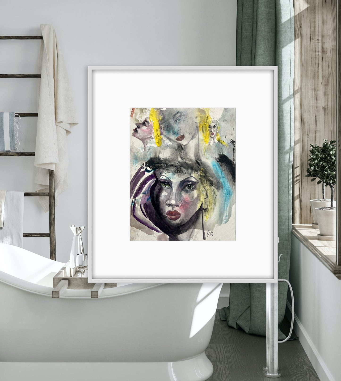 Close-up mockup of a framed female abstract portrait decorating a minimalist spa-style bathroom.