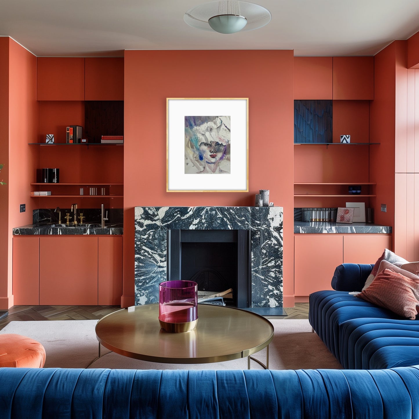 White Reverie framed watercolor portrait hanging above a fireplace in a bold interior with terracotta walls and navy blue sofa